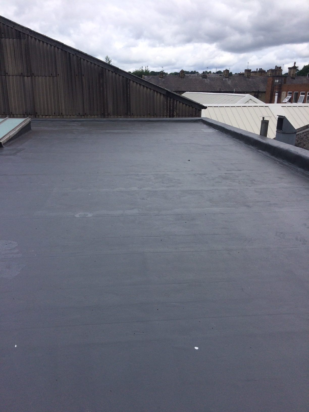 Dawson rentals, Brighouse gets a new flat roof - Alpine Roofing